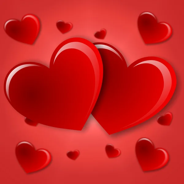 Herzen auf rotem Hintergrund — Stockfoto