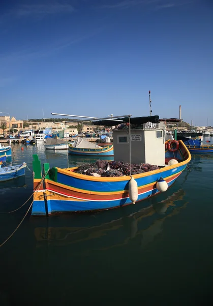 stock image The maltese fishing village, colorful boats