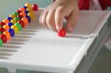 Child playing close up hands