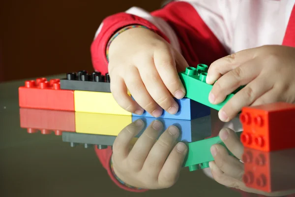 Child playing with blocks — Stock Photo, Image