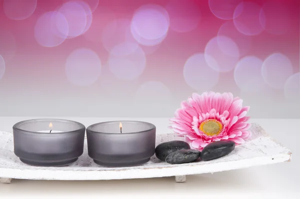 Wellness-Set mit rosa Blume und Bambus Stockbild