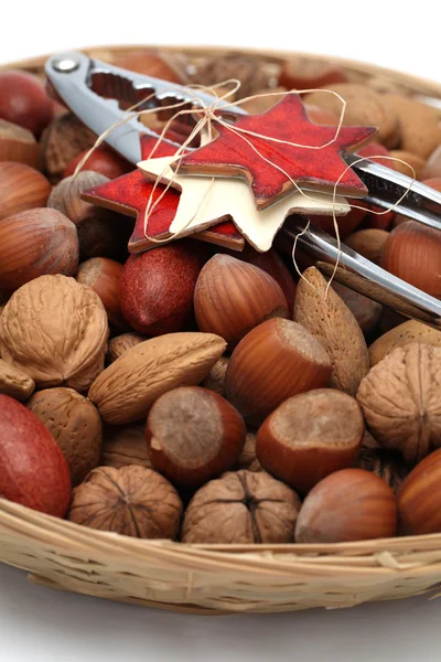 Christmas basket with nuts and nutcracker — Stock Photo, Image
