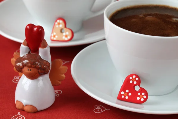 Kaffee mit Herzen und Engel — Stockfoto