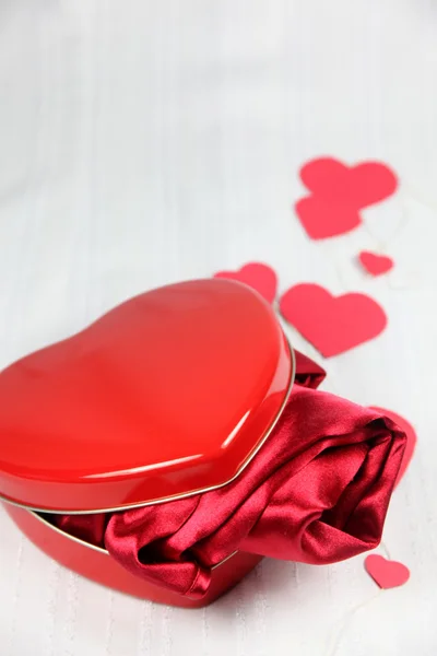 Heart shaped box with a gift — Stock Photo, Image