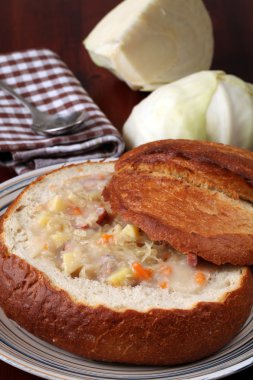 Cabbage soup i a bread bowl clipart