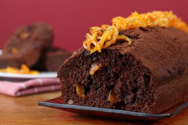 Chocolate cake with candied orange peel clipart