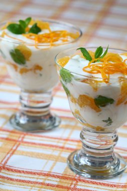 Mint yogurt with oranges clipart