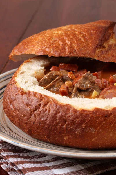 stock image Goulash soup in a bread bowl