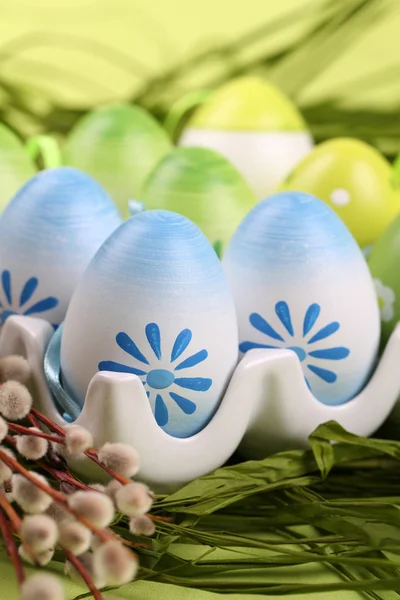 Colorful Easter eggs in an egg holder — Stock Photo, Image