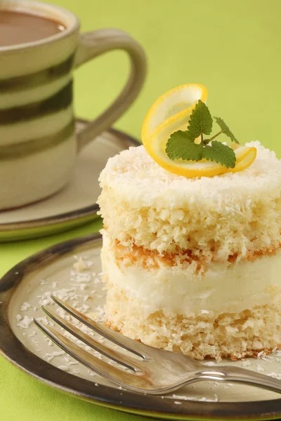 Coconut and lemon cake with coffee — Stock Photo, Image