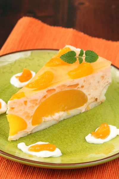 Peach mousse with tangerines — Stock Photo, Image