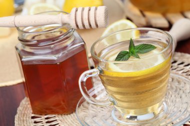 Tea with honey and lemon clipart