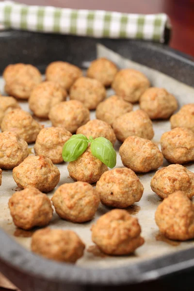 Meatballs on baking sheet — Stock Photo, Image