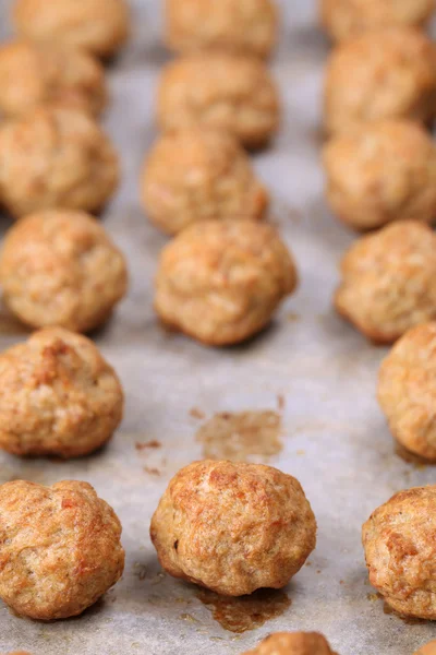 Meatballs on baking sheet — Stock Photo, Image