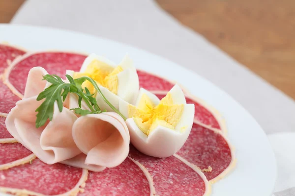 Parmesan crust salami with ham and eggs — Stock Photo, Image