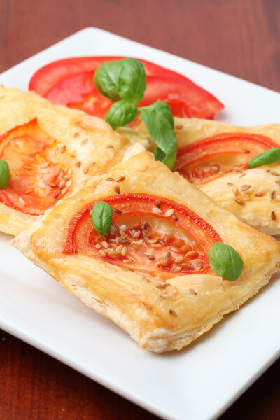 Puff pastry with cheese and tomatoes
