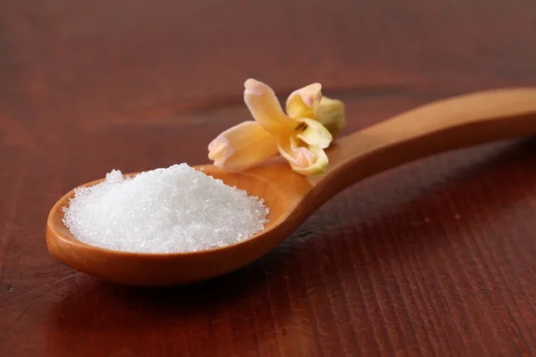 stock image Caster sugar in a wooden spoon