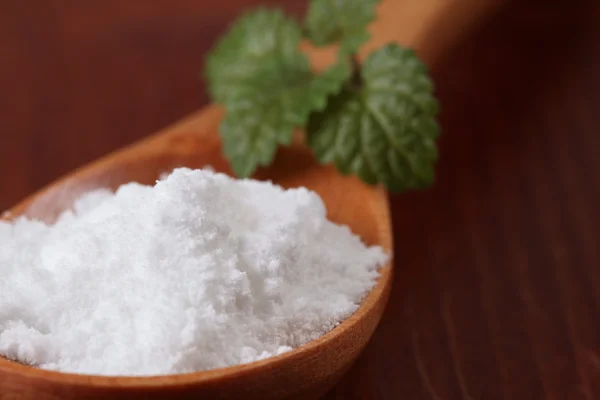 stock image Icing sugar in a wooden spoon