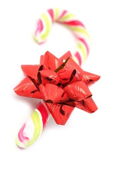Caña de caramelo con lazo rojo — Foto de Stock