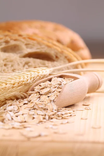 Oats and fresh bread — Stock Photo, Image