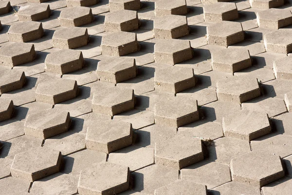 Declive exterior de pedras hexagonais simétricas — Fotografia de Stock