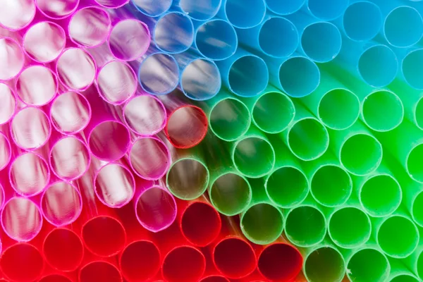 Colorful straws with the bright light shining through them — Stock Photo, Image