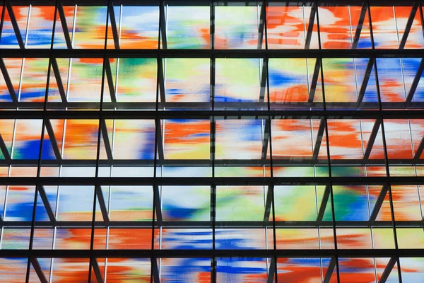 Many colored windows inside a modern building — Stock Photo, Image
