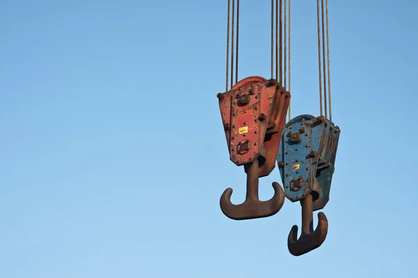 Two crane hooks with copyspace for text — Stock Photo, Image
