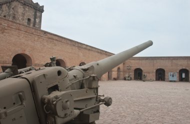 Old cannon in military museum clipart