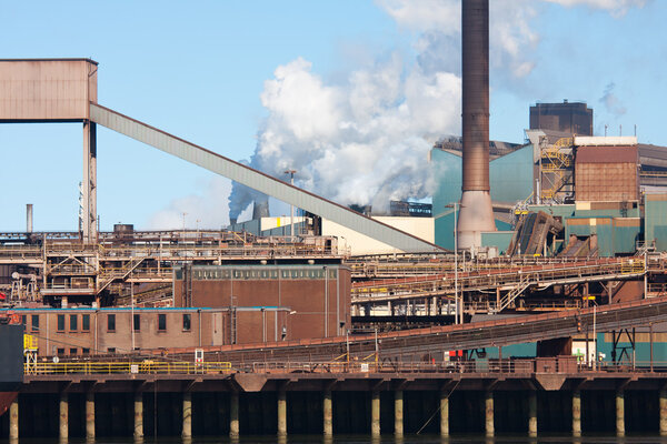 Steel factory with smokestack