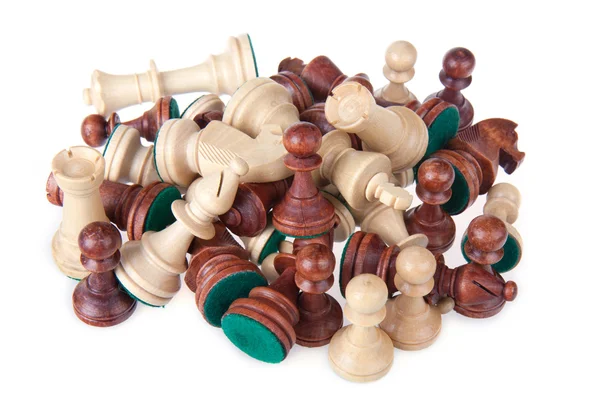 Heap of chess pieces isolated on white — Stock Photo, Image