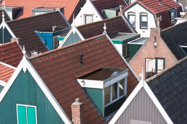 Facing the roofs of an old pittoresk village in the netherlands clipart