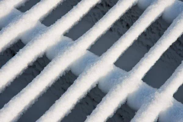 Cattle grid covered with fresh new snow — Stock Photo, Image