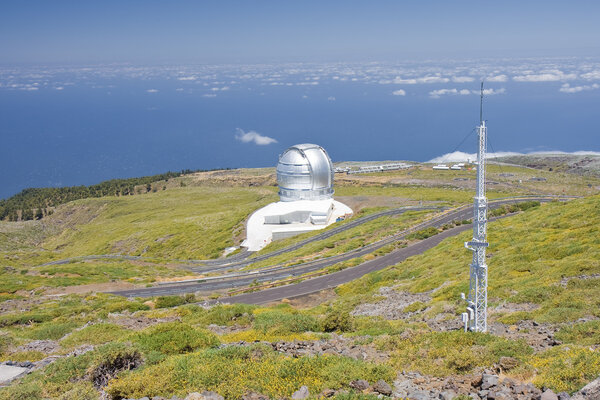 Telescope above the clouds at the highest peak of La Palma, Canary Islands