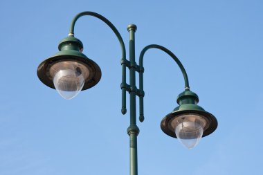 Modern green double lamppost