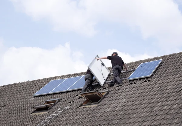 Installing solar panels Stock Image