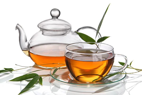 Tazza di tè con teiera — Foto Stock