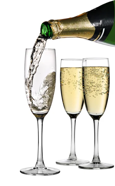 Champagner ins Glas gegossen — Stockfoto