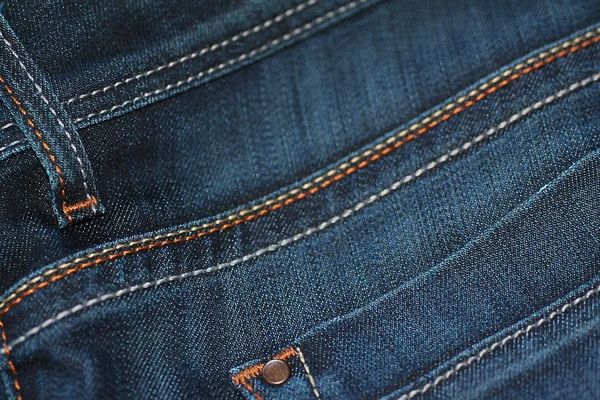 Macro blue jeans achtergrond — Stockfoto