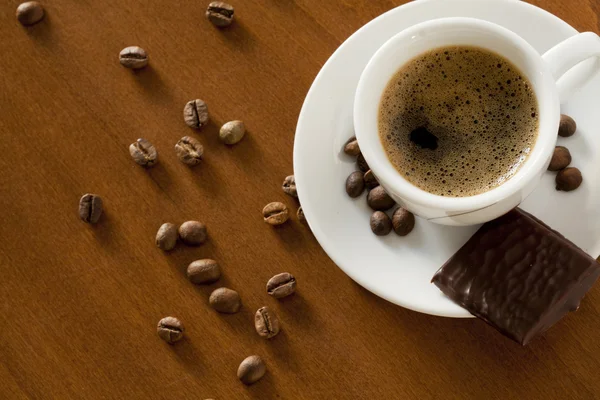 Taça de café e chocolate doce — Fotografia de Stock