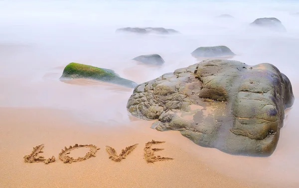 Amore in spiaggia . — Foto Stock