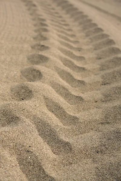 stock image Tire track on the sand.