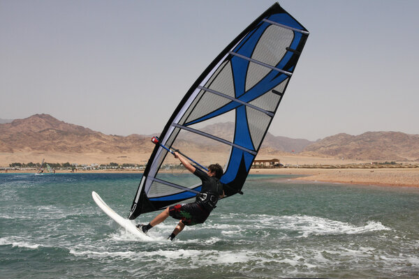 Turning windsurfer.