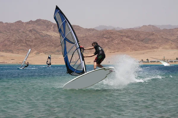 stock image Jump. Young windsurfer.