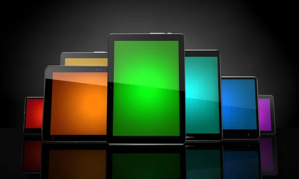 Digital pads with colorful touchscreens on black — Stock Photo, Image