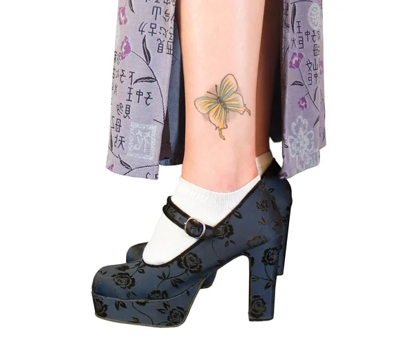 Platform shoes and a tattoo — Stock Photo, Image