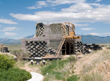 Earthship under construction clipart