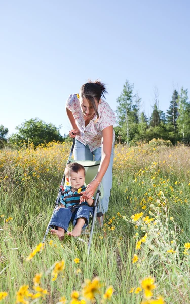 Mother and baby son taking a walk — Stock Photo, Image