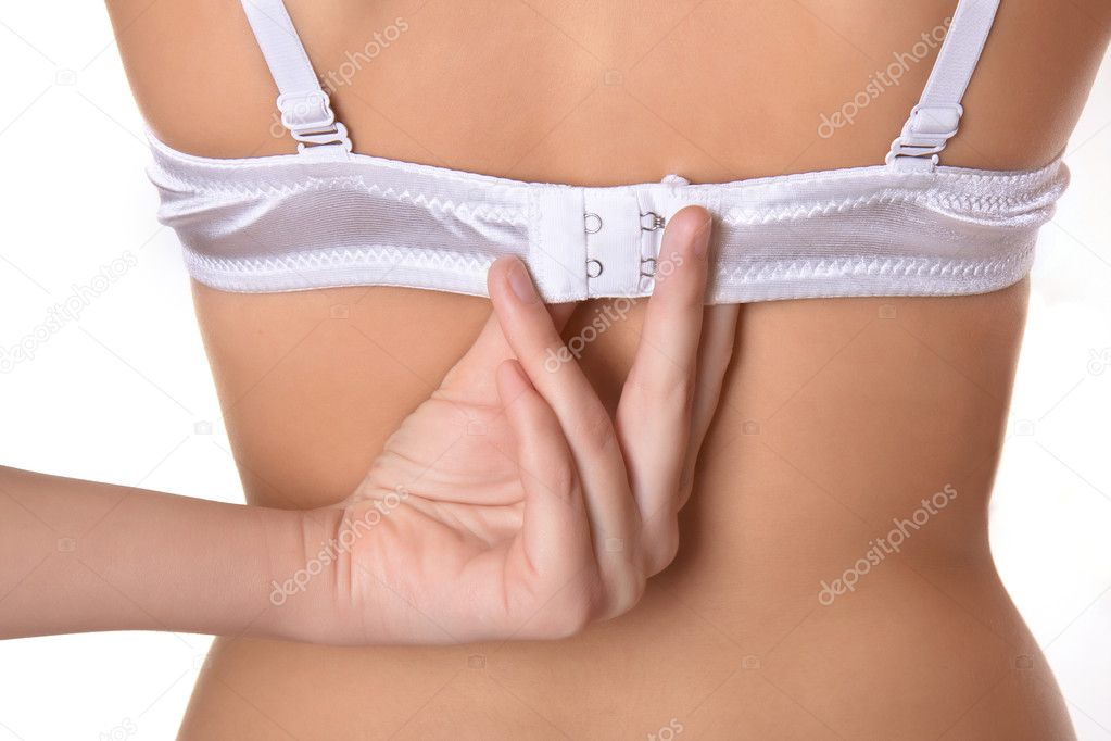 Hand and woman's bra