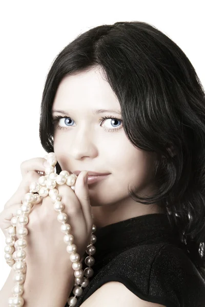 Mädchen Modell Seil aus Perlen in den Händen von — Stockfoto